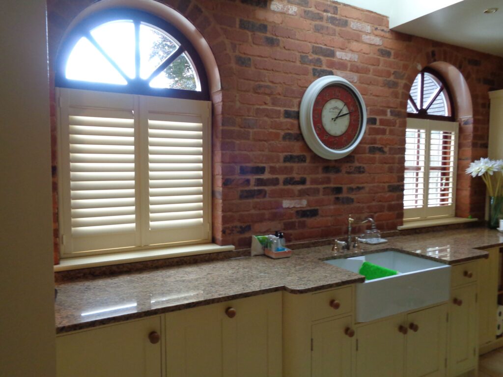 cafe shutters on a round window